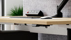 Formetiq Alto 1 intuitive 2-button controller close-up on Oak top