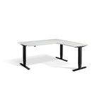 Lavoro Advance Corner triple-motor standing desk, black frame and light grey desktop; pictured size representative
