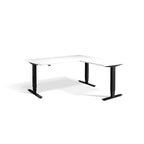 Lavoro Advance Corner triple-motor standing desk, black frame and white desktop; pictured size representative