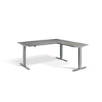 Lavoro Advance Corner triple-motor standing desk, silver frame and graphite desktop; pictured size representative