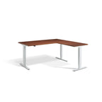 Lavoro Advance Corner triple-motor standing desk, white frame and natural dijon walnut desktop; pictured size representative
