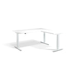Lavoro Advance Corner triple-motor standing desk, white frame and white desktop; pictured size representative