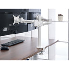 White Lavoro Twin Monitor Arm supporting two monitors on a desk in a light workspace