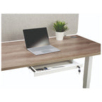 White Vault under-desk lockable drawer shown open with keys and stationery below wood-effect desk; illustrative view