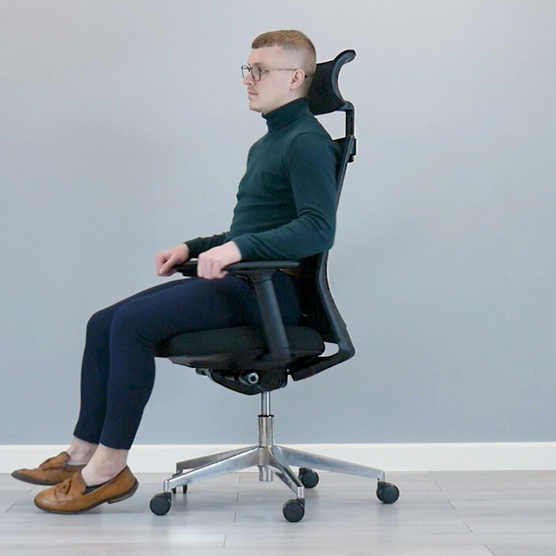 Sculpted backrest contouring with height-adjustable armrests